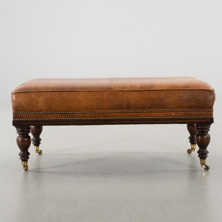 A CHESTERFIELD STYLE OTTOMAN, around year 2000.