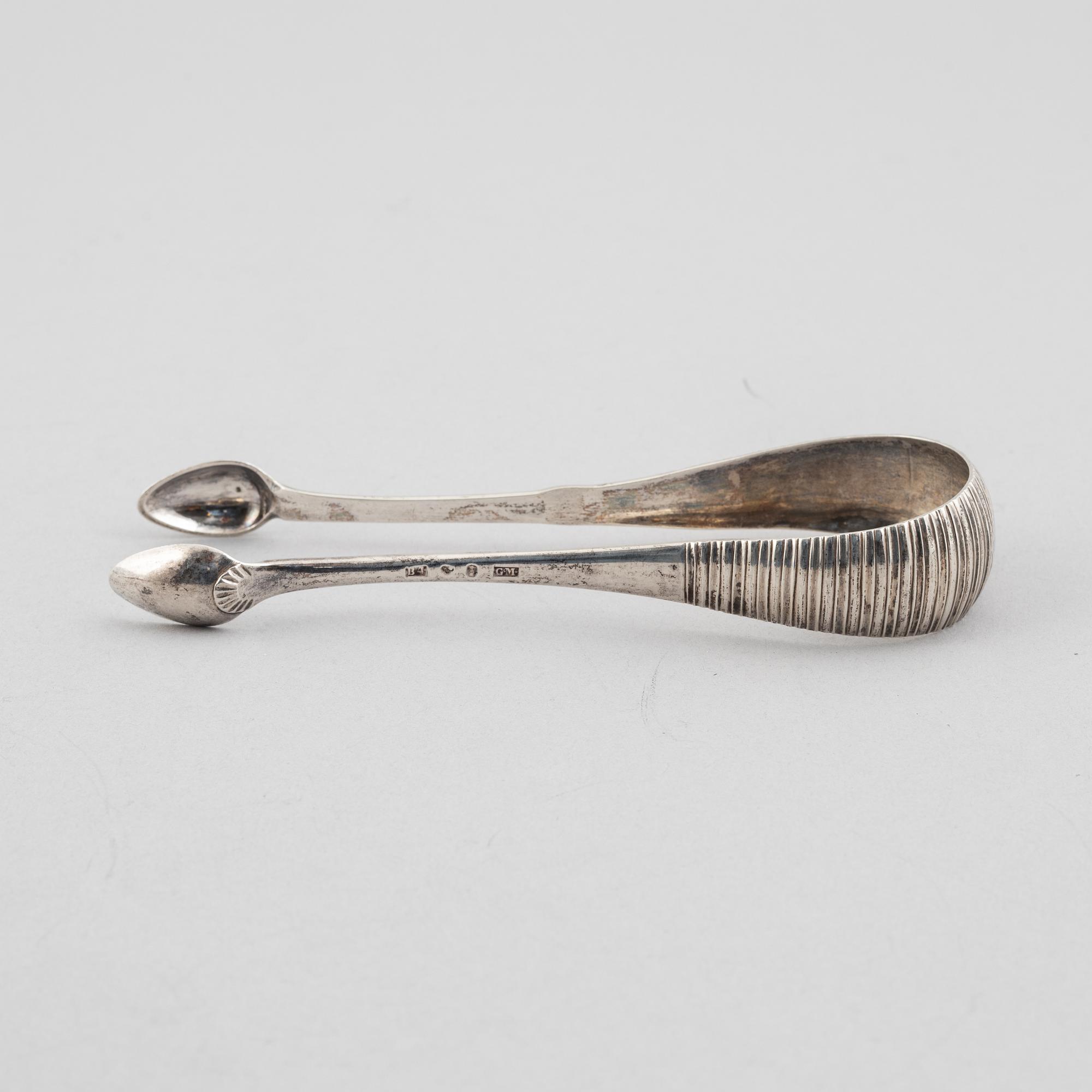 Three silver tongs, Sweden and Denmark, 1834-1923.
