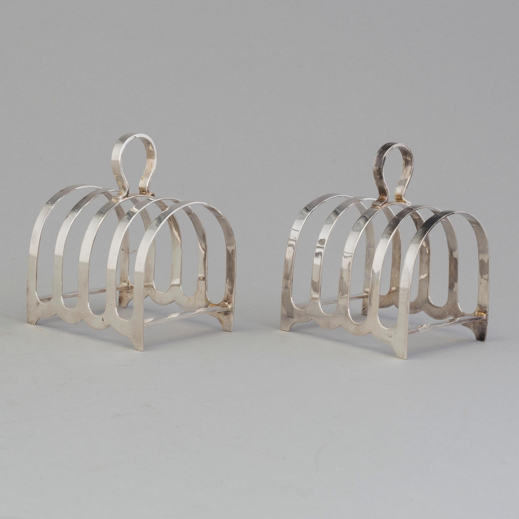 A pair of silver toast racks by Robert F. Mosley, Sheffield, England 1944.