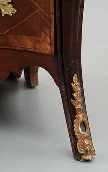 A Swedish Rococo 18th Century corner commode.