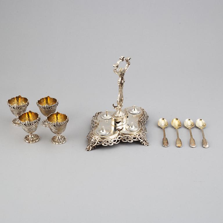An English silver-gilt egg cruet set, mark of James Charles Edington, London 1857.
