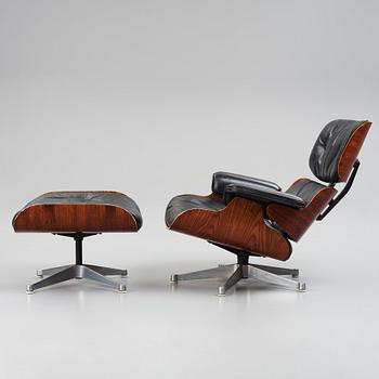 Charles & Ray Eames, a 'Lounge chair' and ottoman, Vitra 1960-1970s.