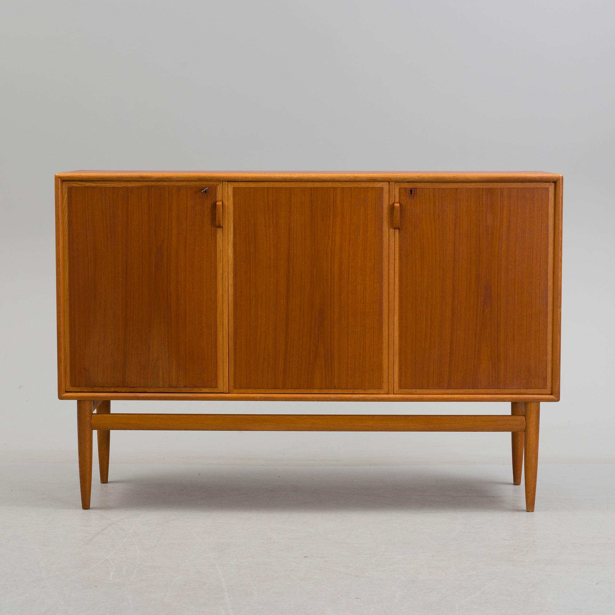 A second half of the 20th century teak veneered sideboard by Bertil Fridhagen, Bodafors, Sweden.