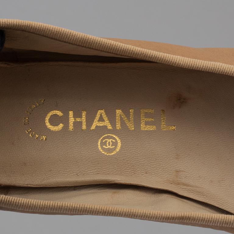 Ballerina shoes by Chanel.