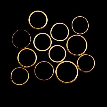 RINGAR, 12 st, 23 k guld. Vikt ca 55 gram.