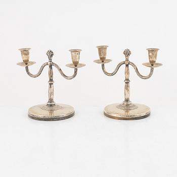 A pair of Swedish silver candlesticks, mark of CG Hallberg, Stockholm 1926.