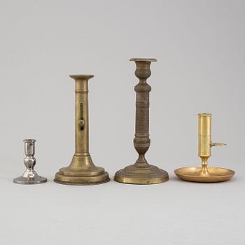 Four 19th/20th century candlesticks.