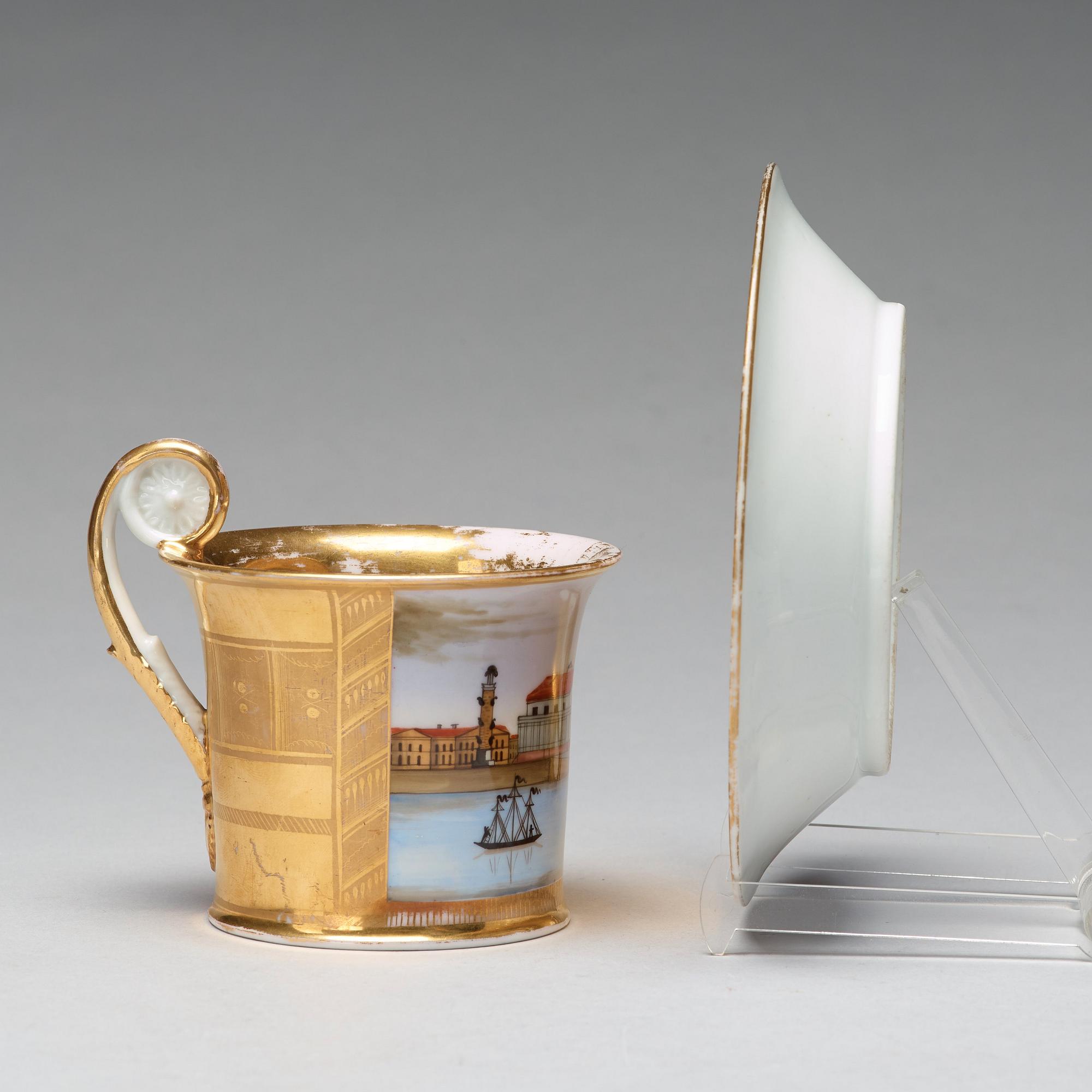 A Russian topograhical cup with saucer, Empire, early 19th Century.