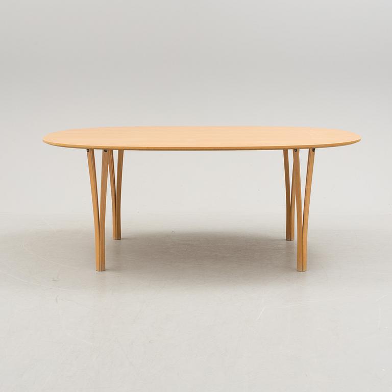 A Bruno Mathsson "Superellips" dinner table for Fritz Hansen, second half of the 20th century.