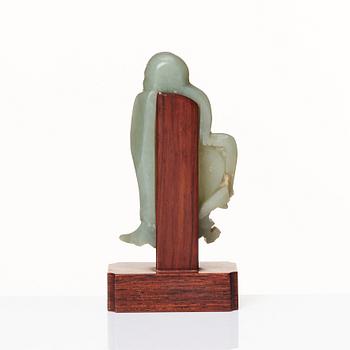 A carved nephrite sculpture of a lohan, Qing dynasty (1664-1912).