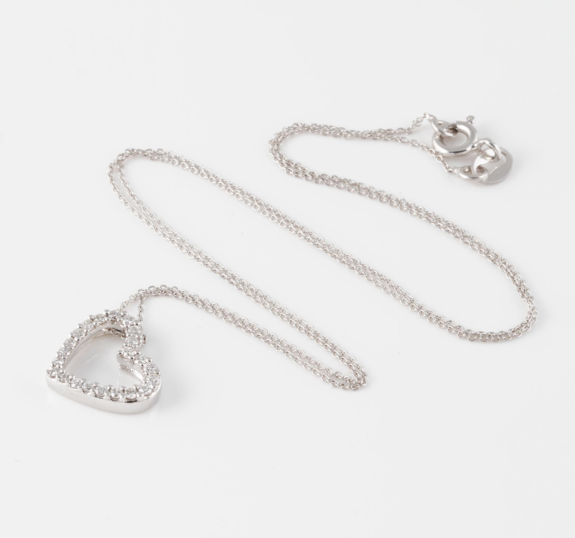 HÄNGE, 18K vitguld med briljantslipade diamanter ca 0.25 ct. Vikt 2,2 gram.