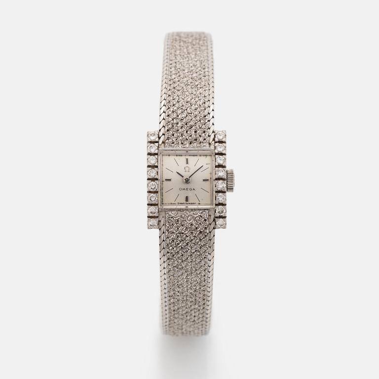 Omega, 18K white gold and brilliant cut diamond ladies watch.