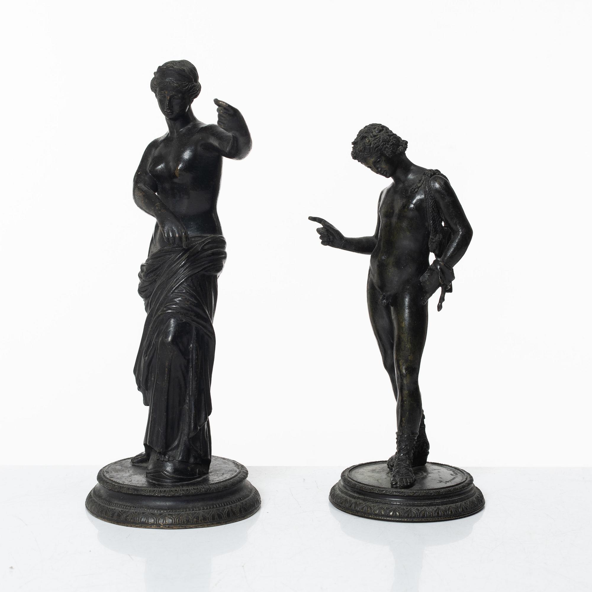 Two bronze sculptures.