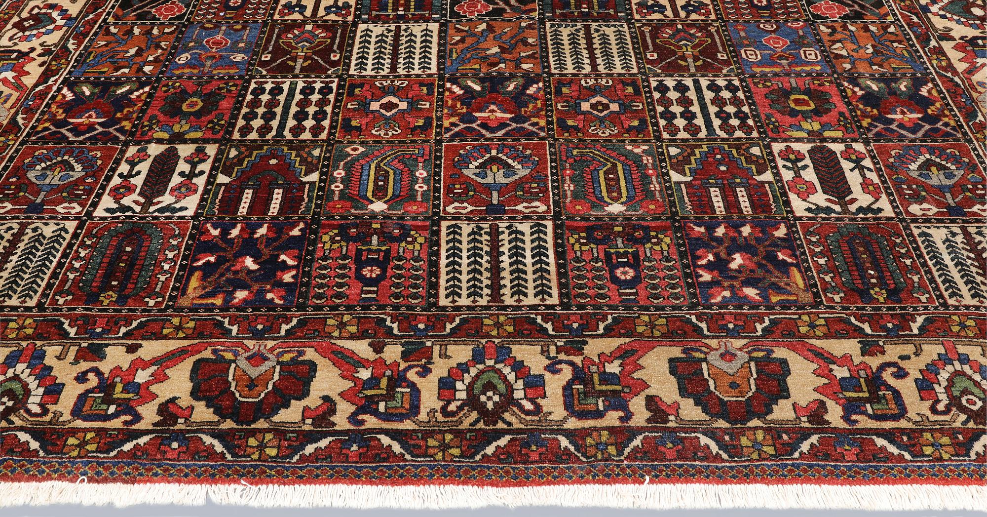 A semi-antique Baktiari carpet, approx. 360 x 308 cm.