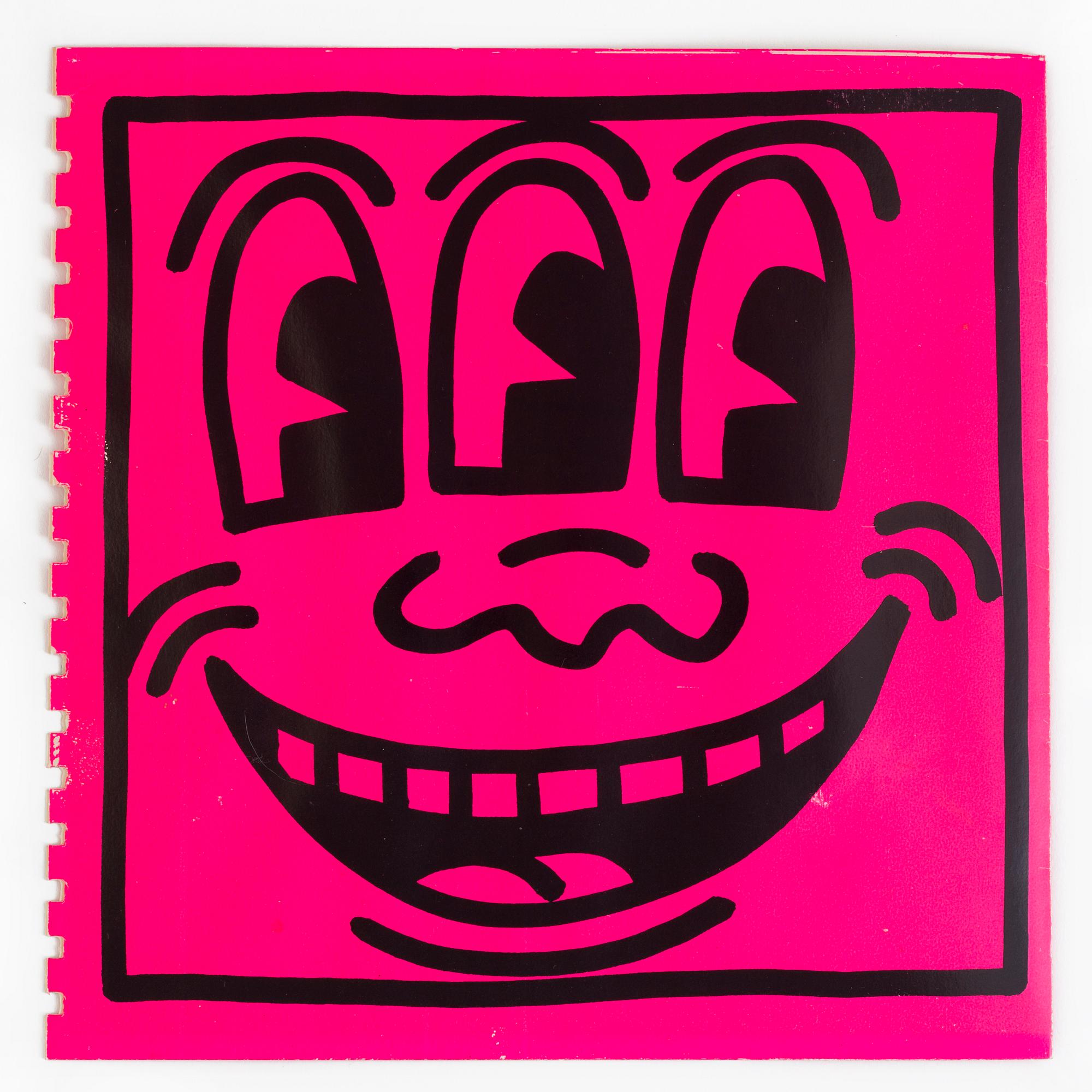 KEITH HARING, drawing on Shafrazi pink cover. Signed and dated - 82.