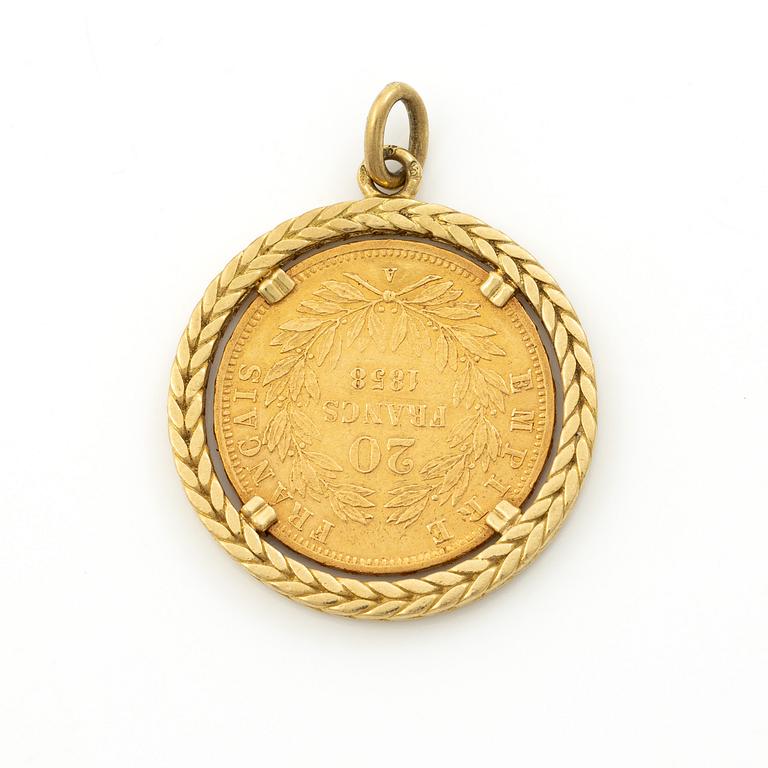 Gold coin, France, Napoleon III, 20 Francs, 1858, set in an 18-carat gold surround.