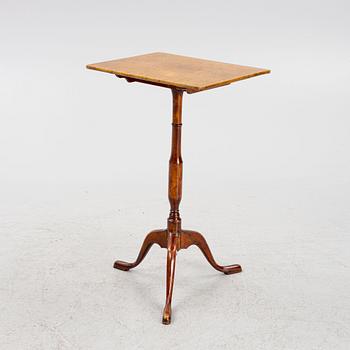 A drop-leaf table, 19th Century.