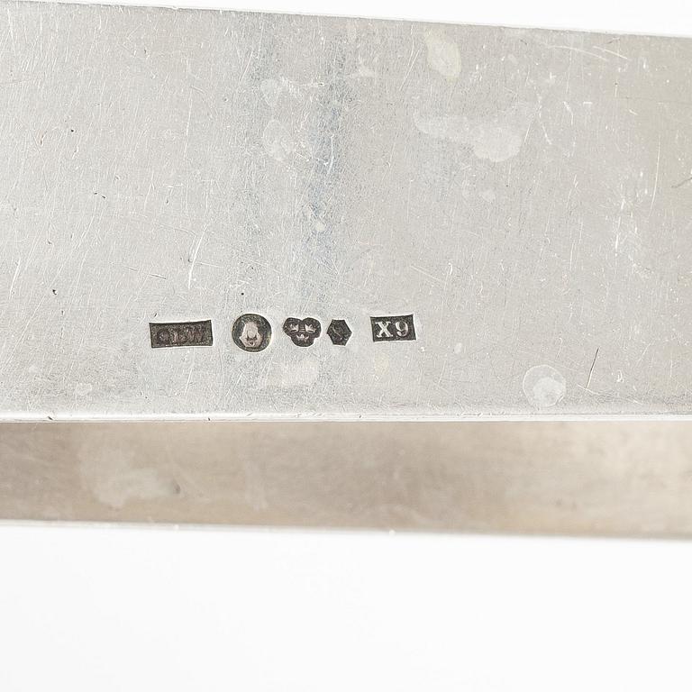 Four silver objects, 20th Century.