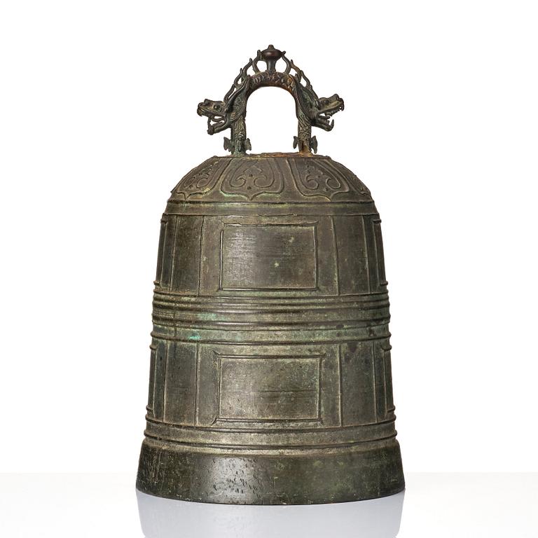 A large inscribed bronze temple bell, Ming dynasty (1368-1644).