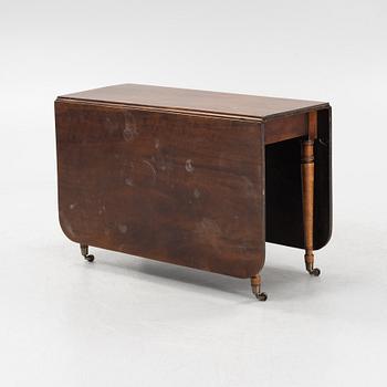 A mahogany dining table, second half of the 19th Century.