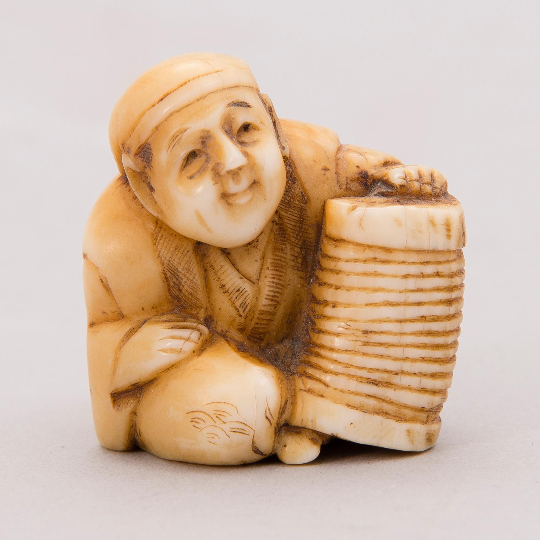 A 19th century Japanese bone netsuke.