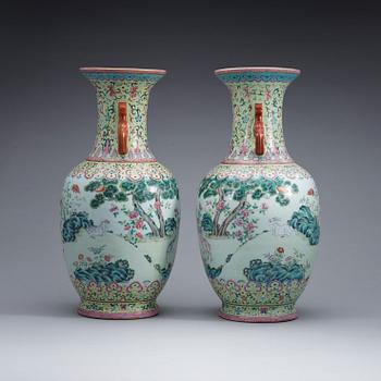 A pair of famille rose vases, Qing dynasty with Qianlong seal mark.