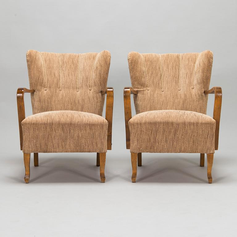 A pair of 1930/1940's open armchairs so called 'K-chair'.