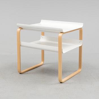 An occational table model 915 by Alvar Aalto for Artek.