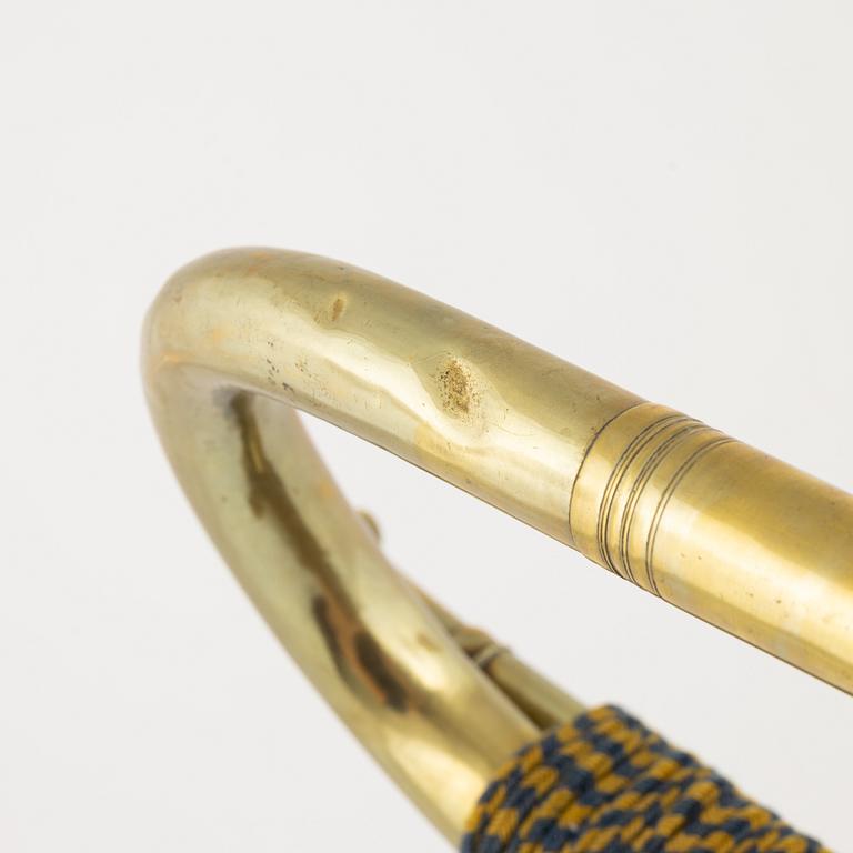 Two military brass signal horns, one marked 'True Sound' Birger Steiner Stockholm.