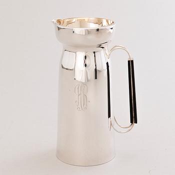 A 1960s silver jug with hardwood handle, Kultateollisuus, Turku Finland 1968.