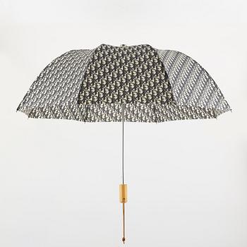 Christian Dior, paraplyer, 2 st, samt bälte.