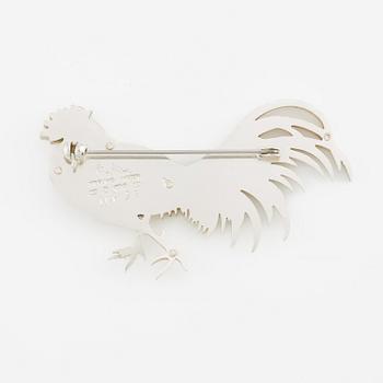 Wiwen Nilsson, brosch, sterlingsilver, i form av tupp, Lund 1970.