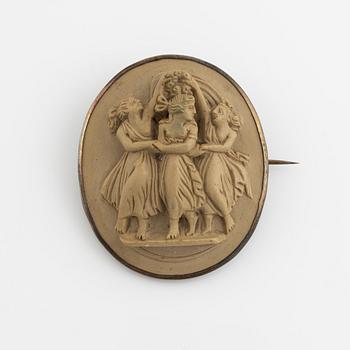 Armband och brosch med lavacaméer.