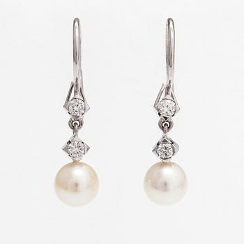 A pair of 18K white gold earrings with cutured pearls and diamonds ca. 0.24 ct in total. Westerback, Helsinki.