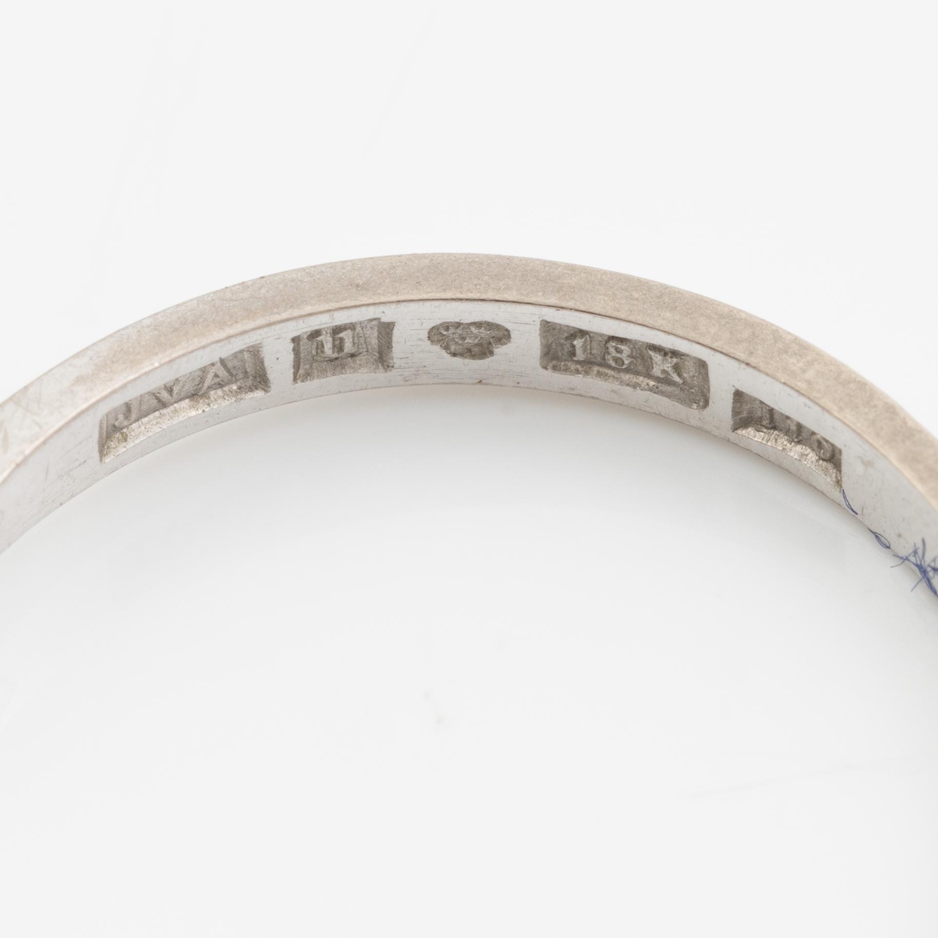 Ring, 18K white gold with brilliant-cut diamond.