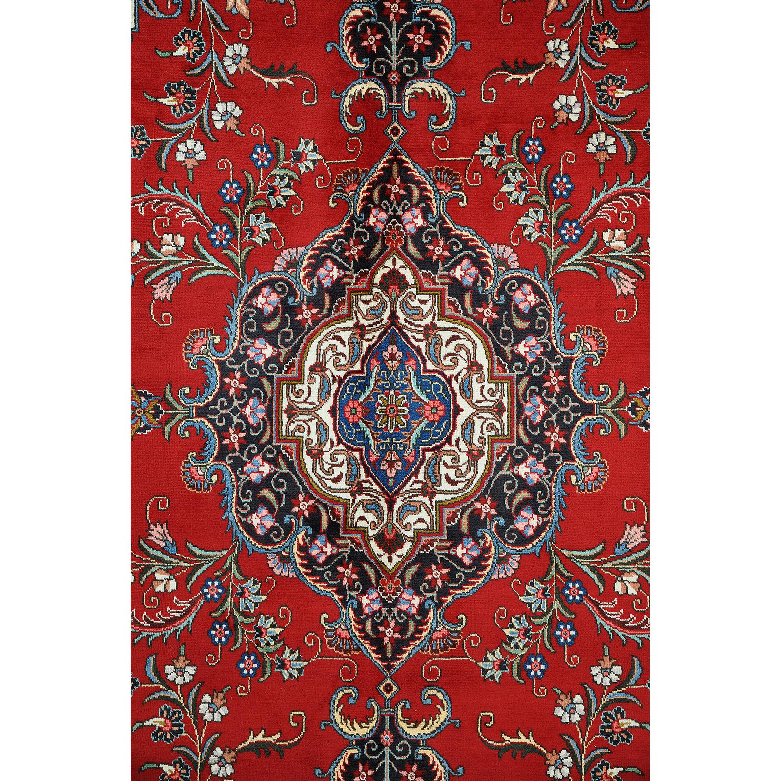 A Tabriz carpet, c 394 x 302 cm.
