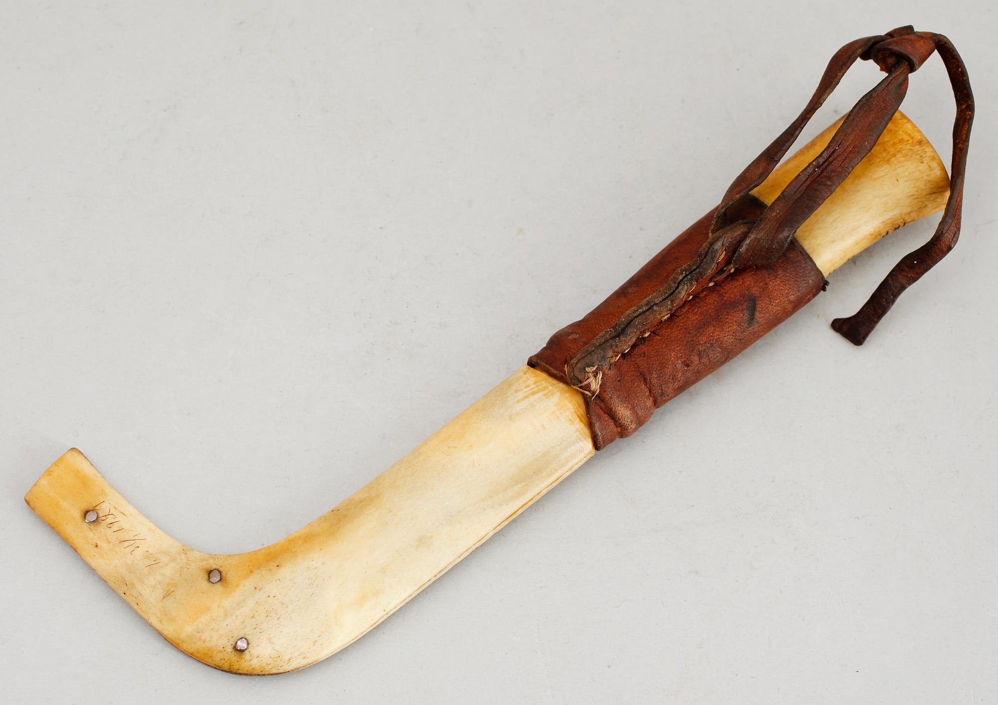 SAMEKNIV, ben och läder, otydl sign, dat 31/1 1929.