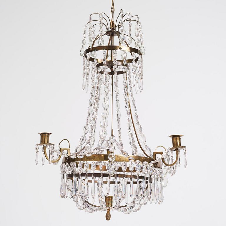 A late Gustavian four-light chandelier, late 18th century.