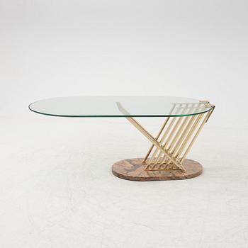 A glass, brass and stone coffee table, 1980's.