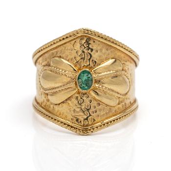 14K gold ring with an emerald.