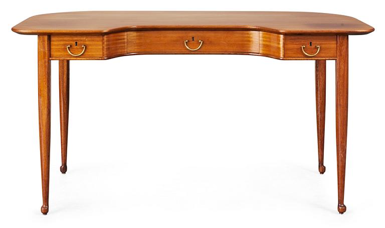 A Josef Frank mahogany desk, model 991, by Svenskt Tenn.