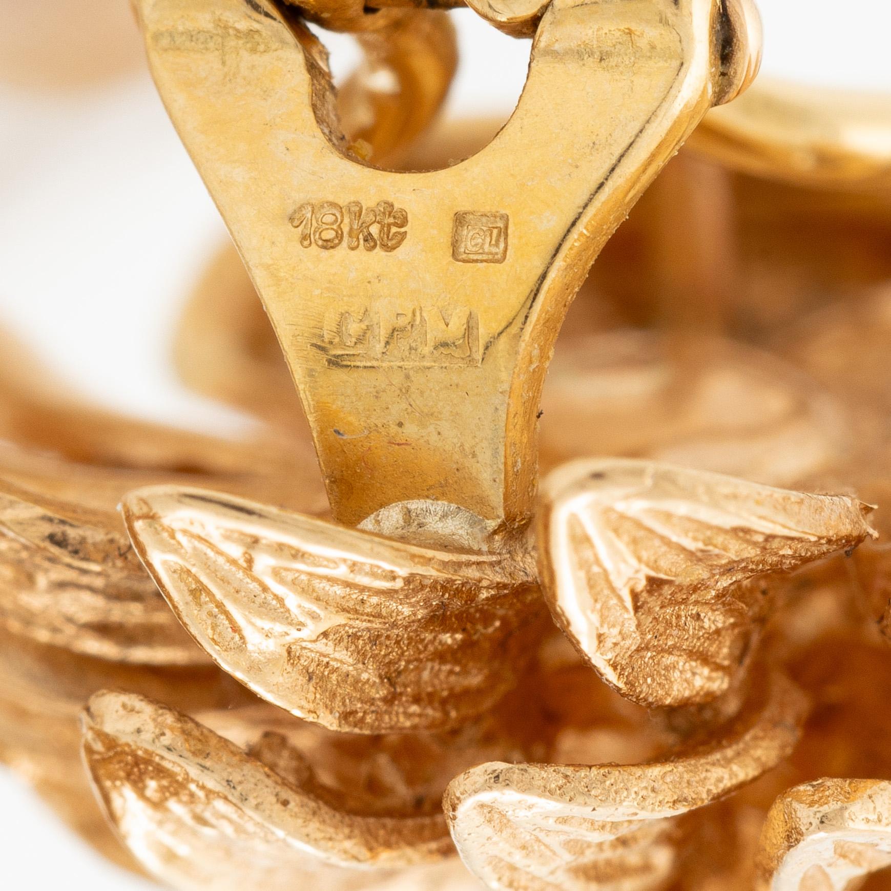 Earrings, 18K gold in the form of leaves.