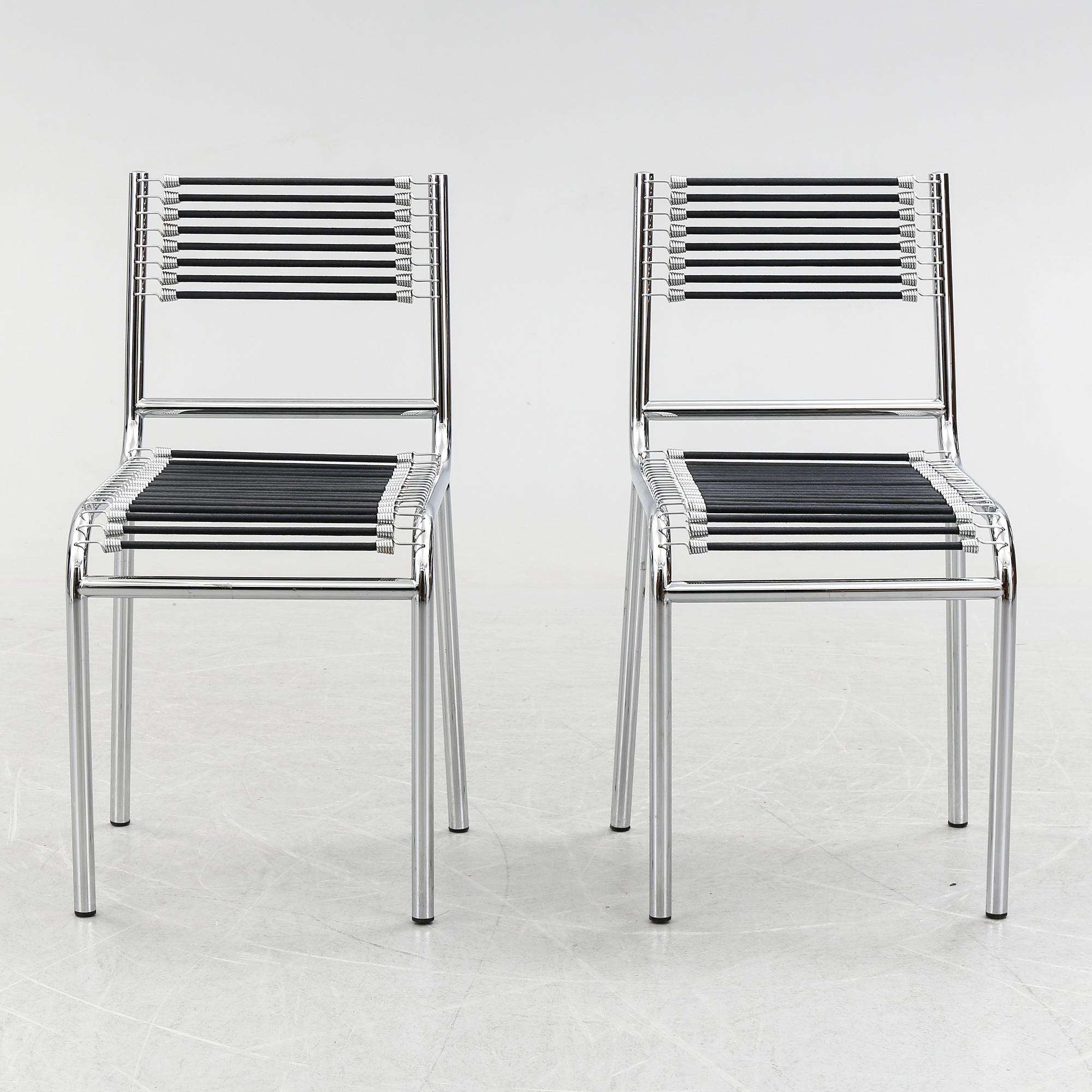 A pair of Rene Herbst chromium-plated, "Sandows" chairs, late 20th century.