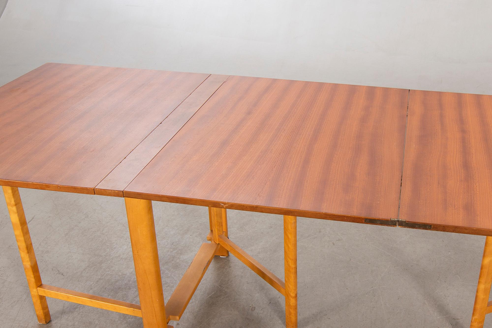 A teak and birch 'Maria Flap' gate leg table by Bruno Mathsson for Karl Mathsson.
