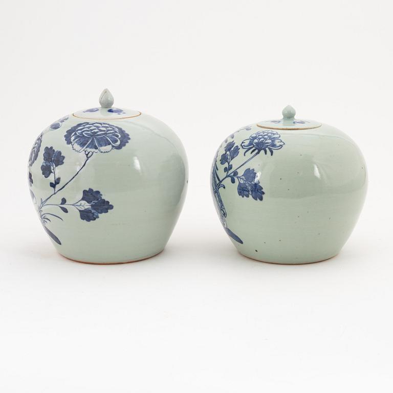 A Chinese a near pair of jars with cover, 20th Century.