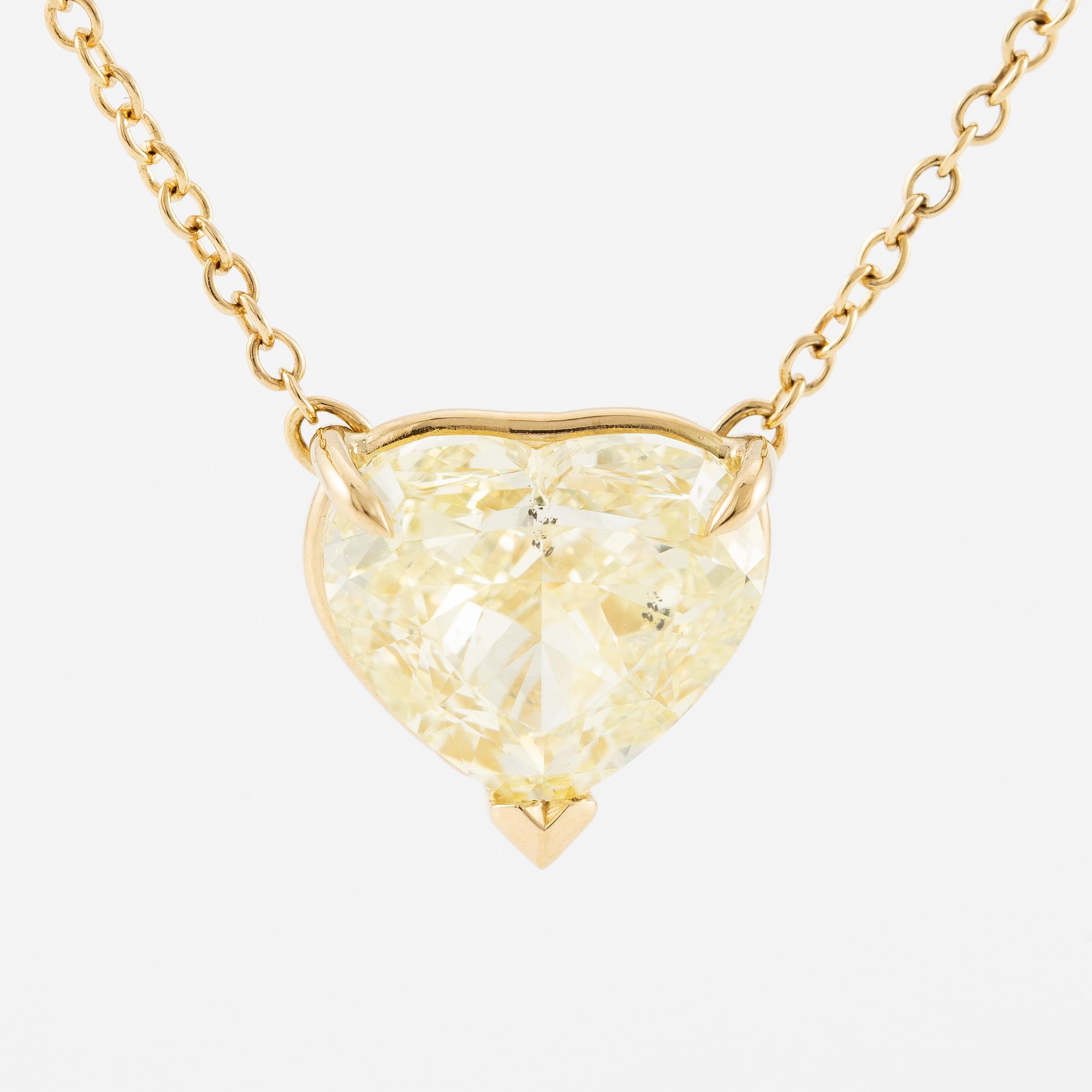 A necklace in 18K gold with a heart-shaped yellow brilliant-cut diamond 4.00 ct Fancy Yellow si1.