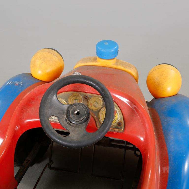 A pedal car from the latter half of the 20th century.