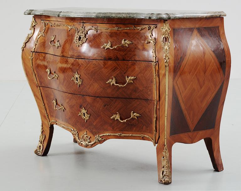 A Swedish Rococo commode attributed to J. J. Eisenbletter.