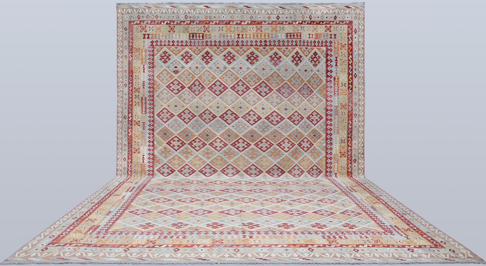 A Kilim carpet, approx. 591 x 401 cm.