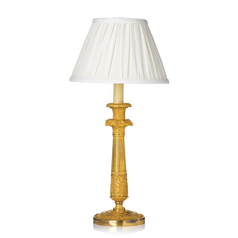 A French Empire ormolu bronze table lamp, early 19th century.